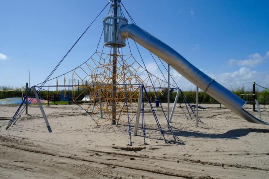Strandhuis De Zon - Recreatiepark De Watersnip Petten Bagian luar foto