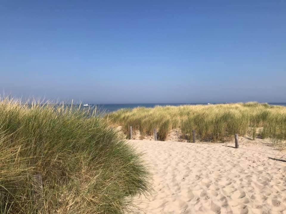 Strandhuis De Zon - Recreatiepark De Watersnip Petten Bagian luar foto