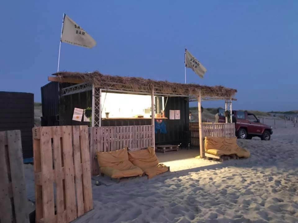 Strandhuis De Zon - Recreatiepark De Watersnip Petten Bagian luar foto