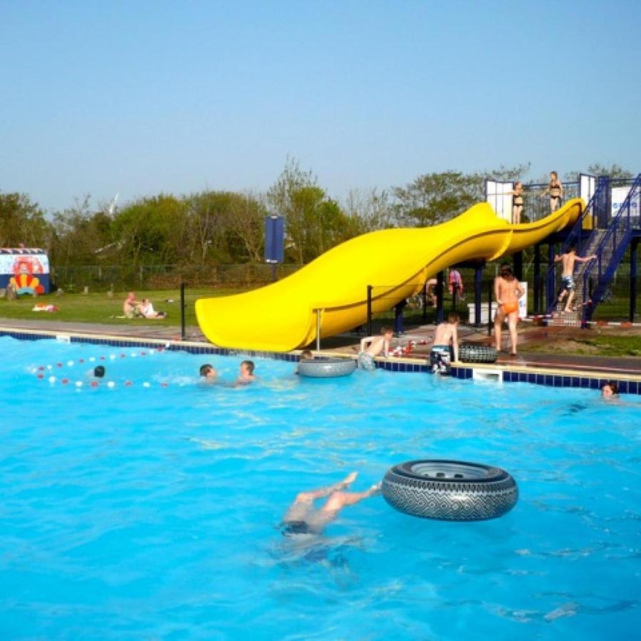 Strandhuis De Zon - Recreatiepark De Watersnip Petten Bagian luar foto